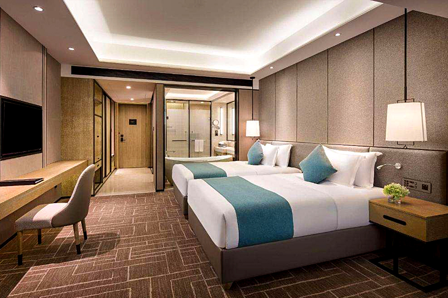 How should hotel room lighting be designed?